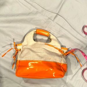 Canvas and orange handbag